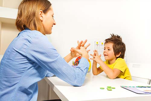 a woman and child at an autism treatment program in hartford, CT